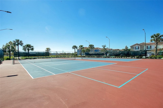 view of tennis court with basketball court