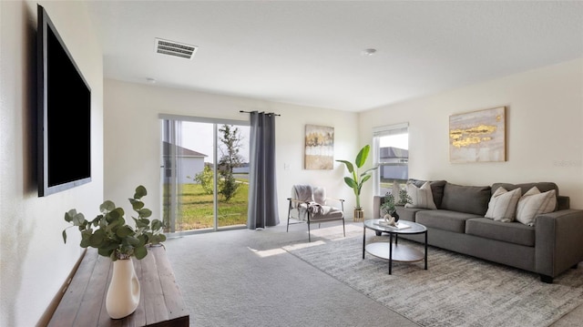 545 Jerry Ln, Haines City, FL 33844 - living room featuring carpet flooring