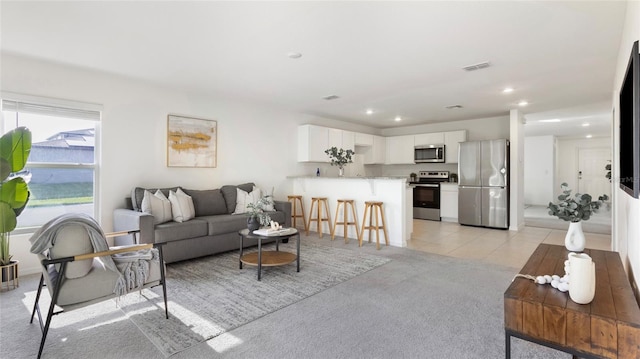 545 Jerry Ln, Haines City, FL 33844 - living area with light carpet and recessed lighting