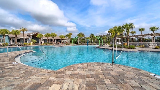 view of swimming pool featuring a patio