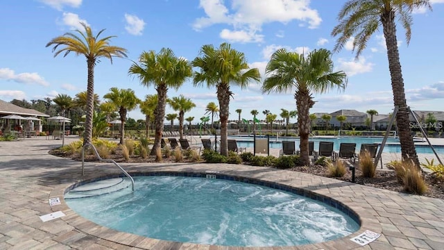 view of pool featuring a community hot tub