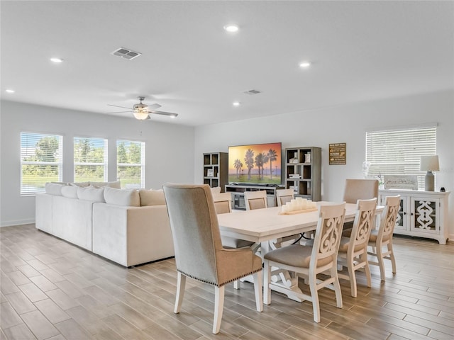 dining room featuring ceiling fan