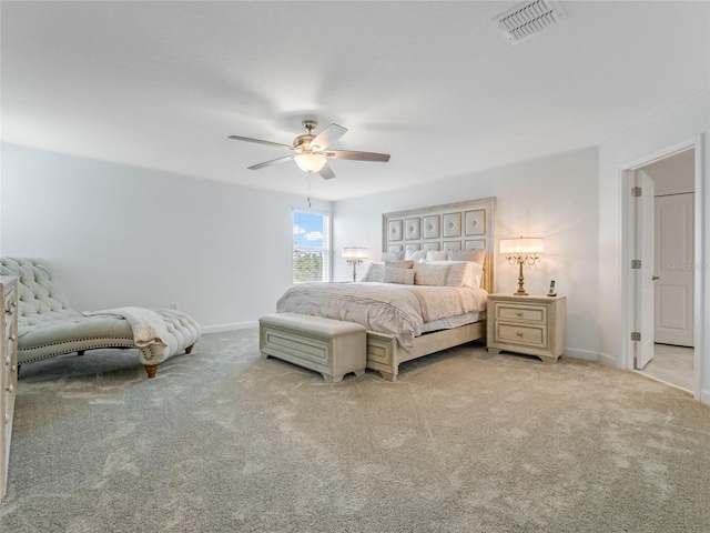 bedroom with light colored carpet and ceiling fan