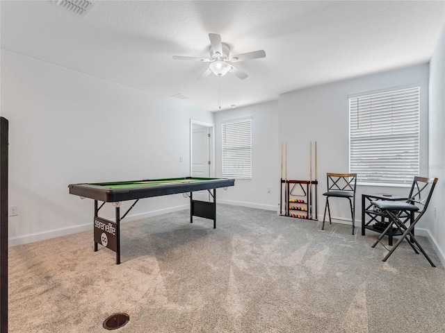 recreation room featuring ceiling fan, a healthy amount of sunlight, pool table, and light carpet