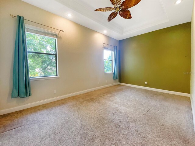 1224 Shorecrest Cir, Clermont, FL 34711 - spare room with recessed lighting, a ceiling fan, baseboards, carpet floors, and a tray ceiling