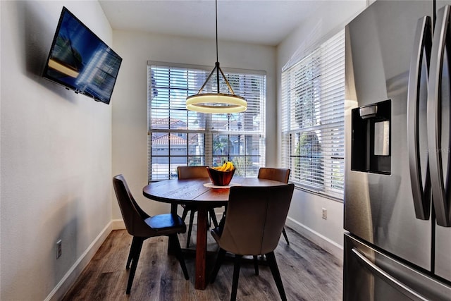 dining space featuring hardwood / wood-style floors