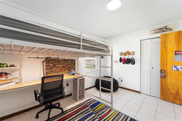 bedroom with light tile patterned flooring