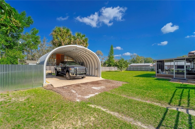 view of yard with a carport