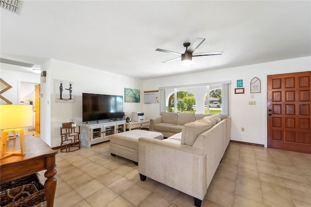 tiled living room with ceiling fan