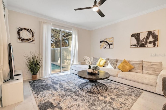 living room with ceiling fan, ornamental molding, and light tile patterned floors