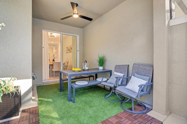 view of patio / terrace featuring ceiling fan