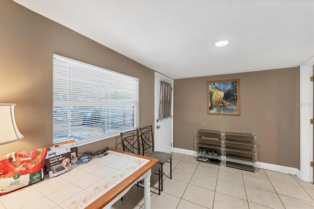 view of tiled dining space