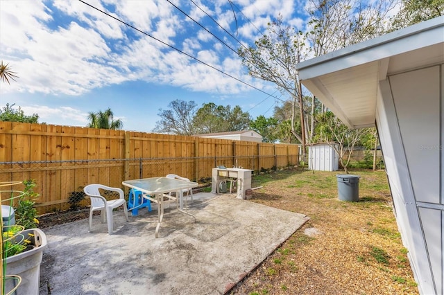 view of patio / terrace with a storage unit