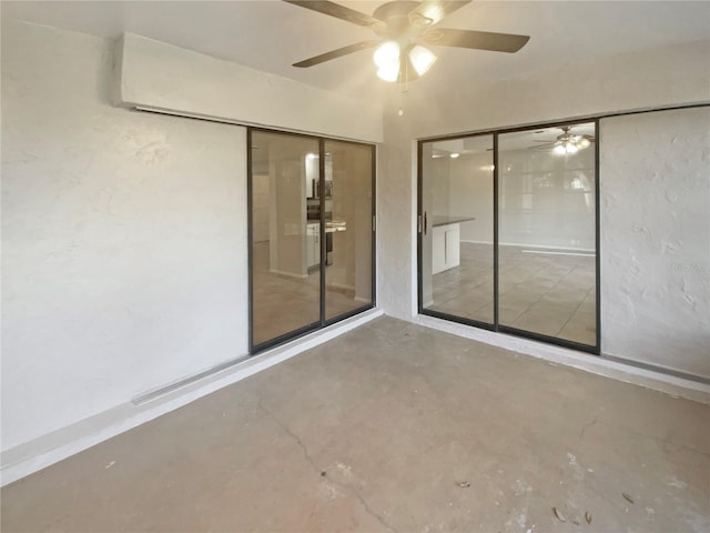 view of patio with ceiling fan