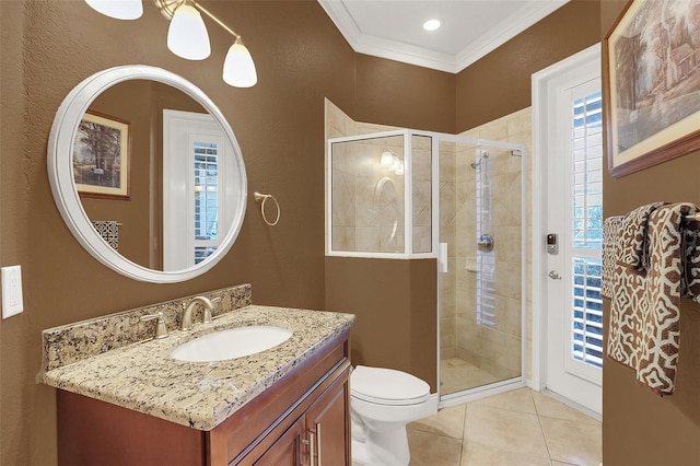 bathroom with tile patterned flooring, toilet, vanity, ornamental molding, and a stall shower