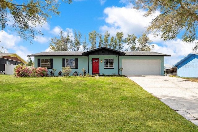 single story home with a garage, driveway, fence, and a front lawn