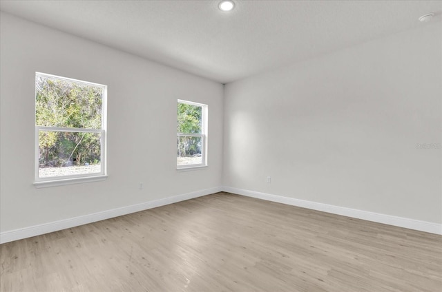 empty room featuring light hardwood / wood-style floors