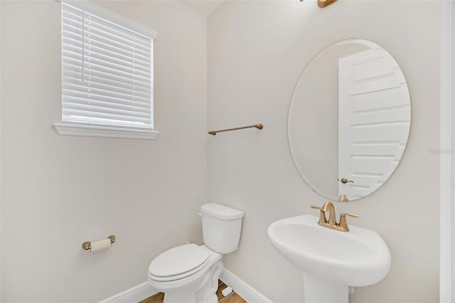 bathroom with sink and toilet