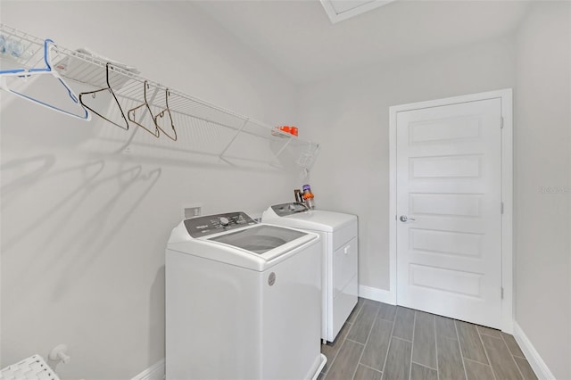 laundry area with washing machine and dryer