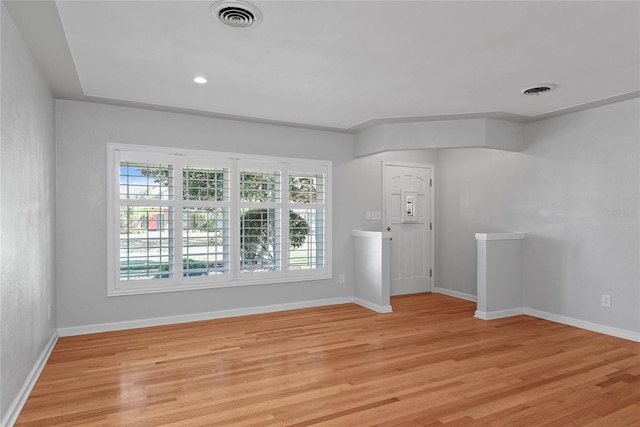 625 Brechin Dr, Winter Park, FL 32792 - empty room with healthy amount of natural light, light wood-style floors, and baseboards