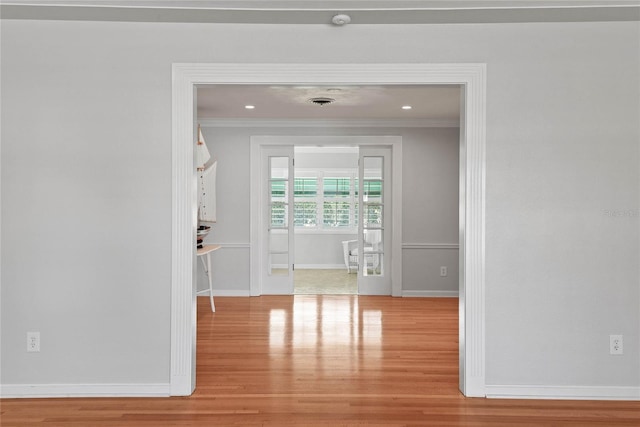 625 Brechin Dr, Winter Park, FL 32792 - hall featuring crown molding, wood finished floors, baseboards, and recessed lighting
