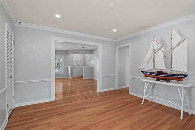 625 Brechin Dr, Winter Park, FL 32792 - hall with light wood-style floors, ornamental molding, baseboards, and recessed lighting