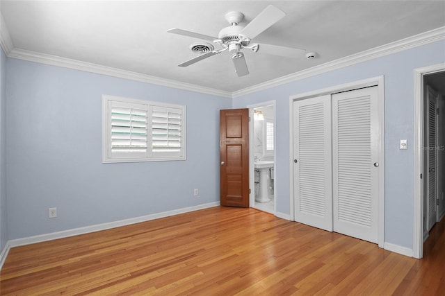 625 Brechin Dr, Winter Park, FL 32792 - unfurnished bedroom featuring a closet, light wood finished floors, crown molding, baseboards, and a ceiling fan
