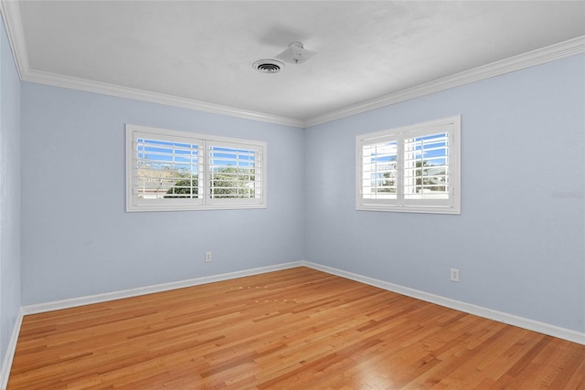 625 Brechin Dr, Winter Park, FL 32792 - unfurnished room with plenty of natural light, baseboards, light wood-style flooring, and crown molding