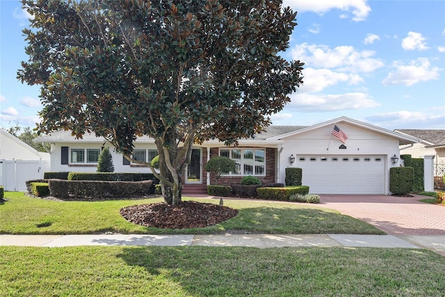 625 Brechin Dr, Winter Park, FL 32792 - view of front of house with a garage and decorative driveway