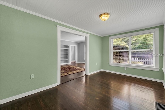 unfurnished bedroom featuring wood-type flooring and crown molding