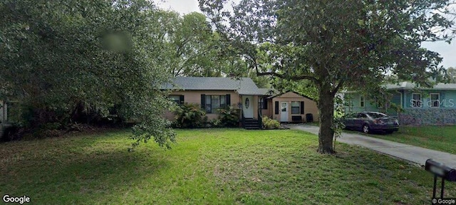 view of front of home with a front yard