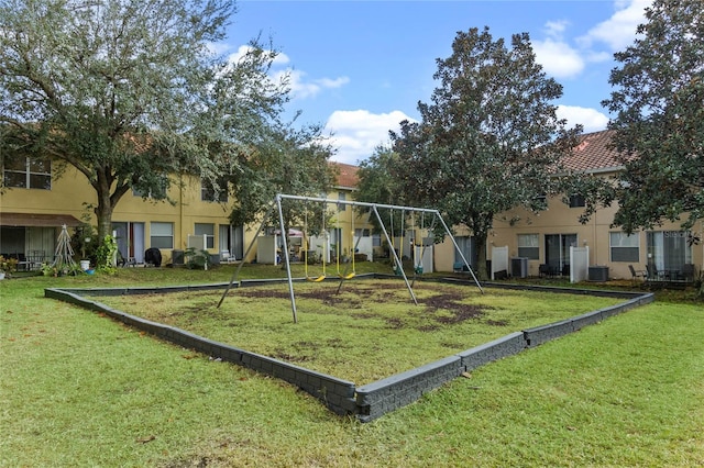 view of jungle gym featuring a yard