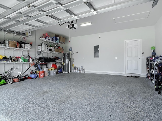 garage with a garage door opener, electric panel, and water heater