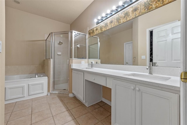 bathroom featuring tile patterned flooring, vanity, and independent shower and bath