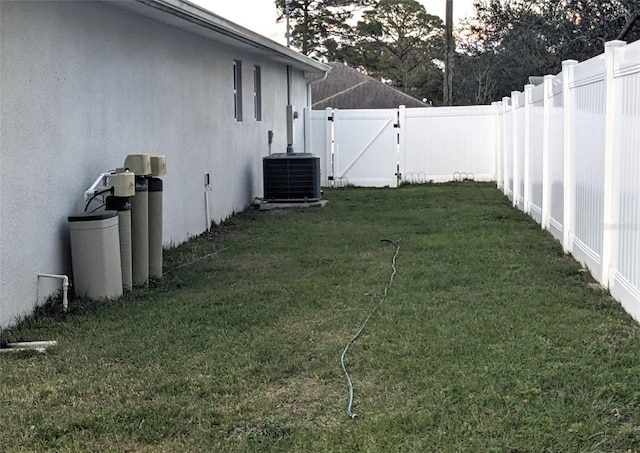 view of yard with central AC unit