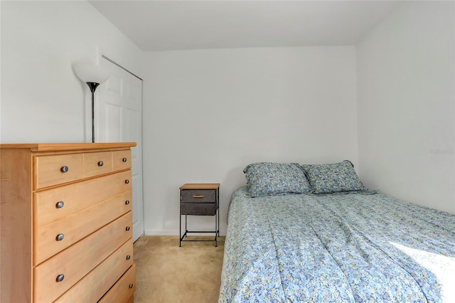 bedroom with light carpet