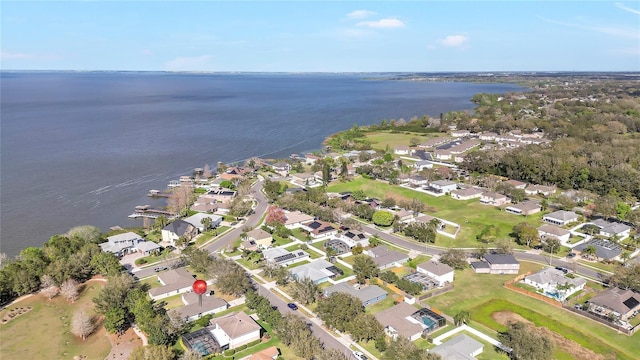 aerial view featuring a water view and a residential view