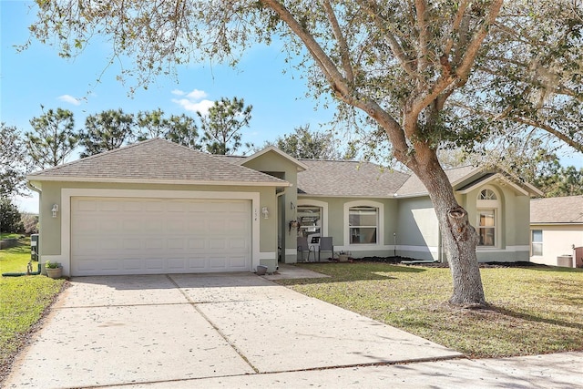 ranch-style home featuring a garage, concrete driveway, and stucco siding