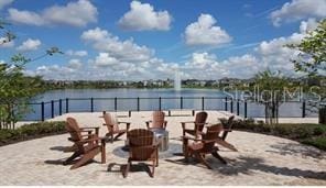 view of patio / terrace with a water view