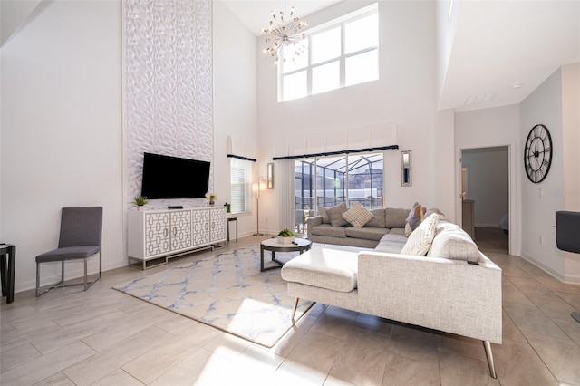 living room featuring a notable chandelier