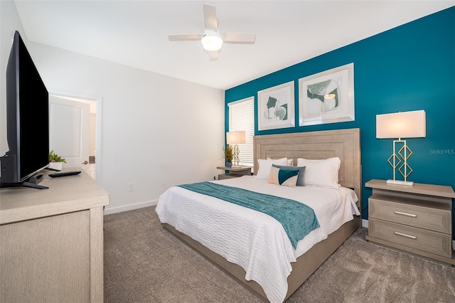 bedroom featuring light carpet and ceiling fan