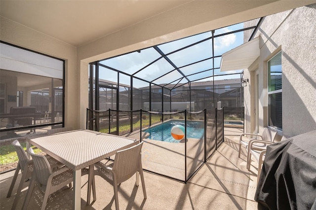 view of patio with a lanai