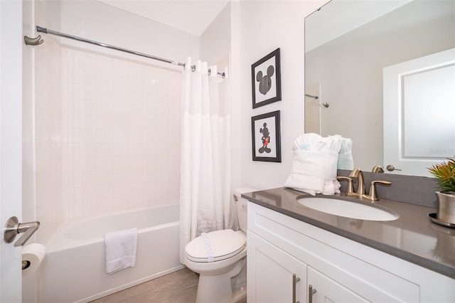 full bathroom featuring vanity, shower / bath combination with curtain, and toilet