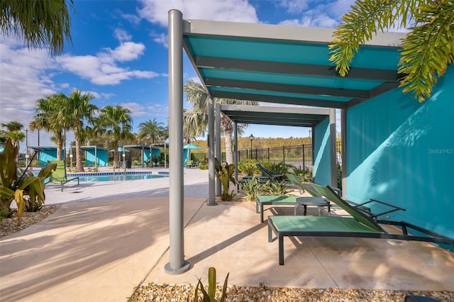 view of patio with a community pool