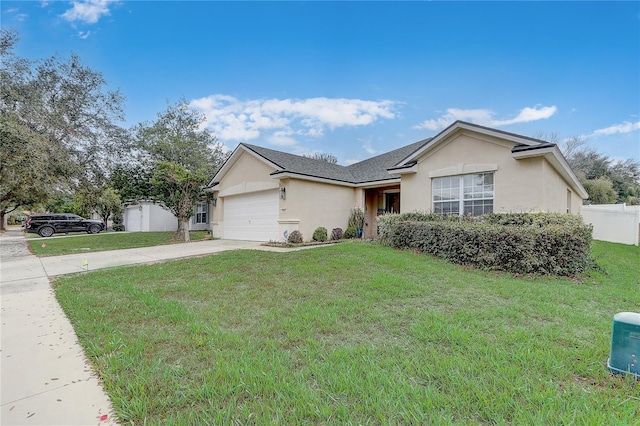 single story home featuring a garage and a front lawn