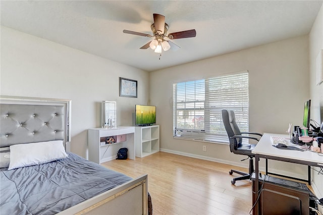 bedroom with light wood-type flooring