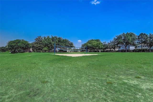 view of yard featuring volleyball court