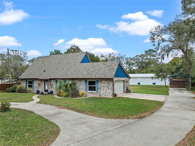 view of front of home featuring a garage and a front lawn