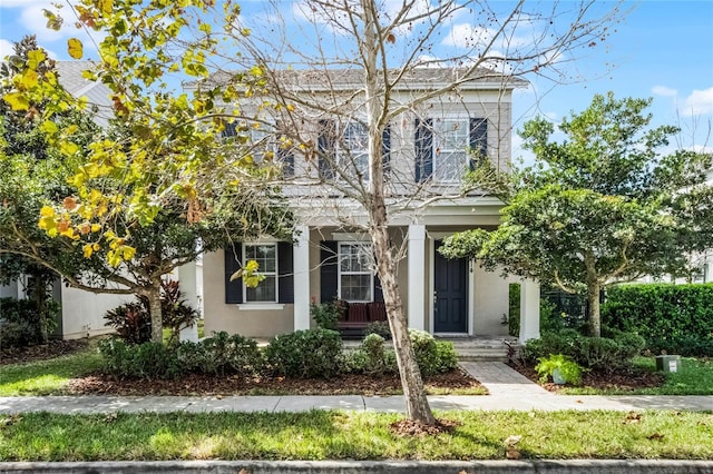 view of front of house featuring stucco siding