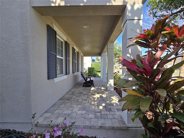 14214 Shocklach Dr, Winter Garden, FL 34787 - view of patio featuring covered porch